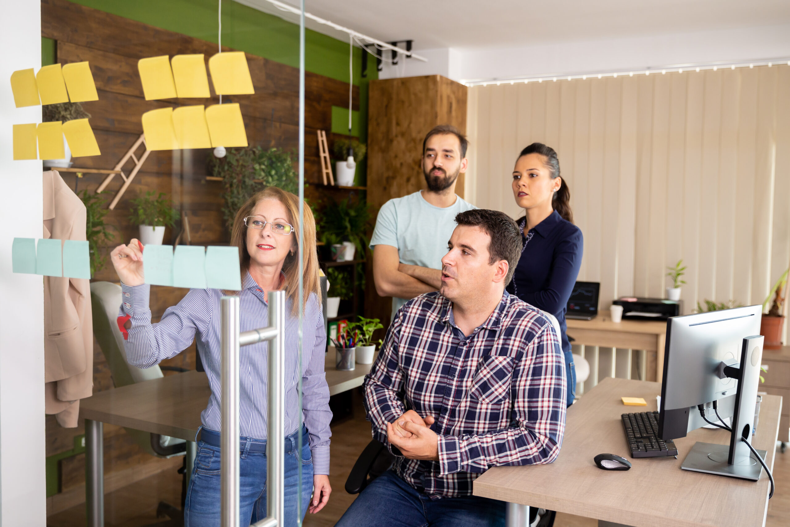 manager explaining to the team new company strategy